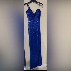 Beautiful blue sequin shiny formal dress. Never been worn.